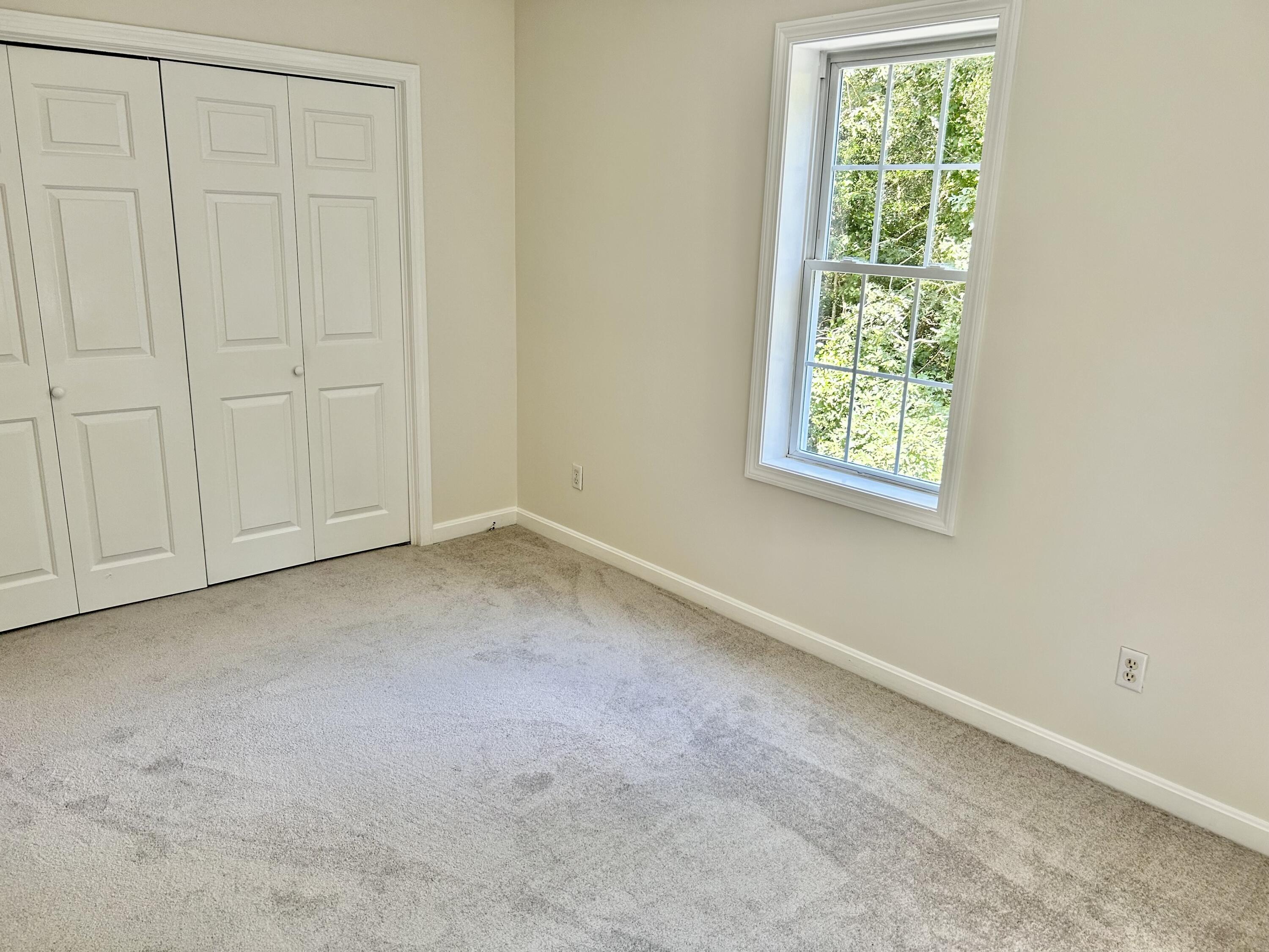 121 Old Post Road Centerville, MA 02632 - Photo 19 of 39 an empty room with a window