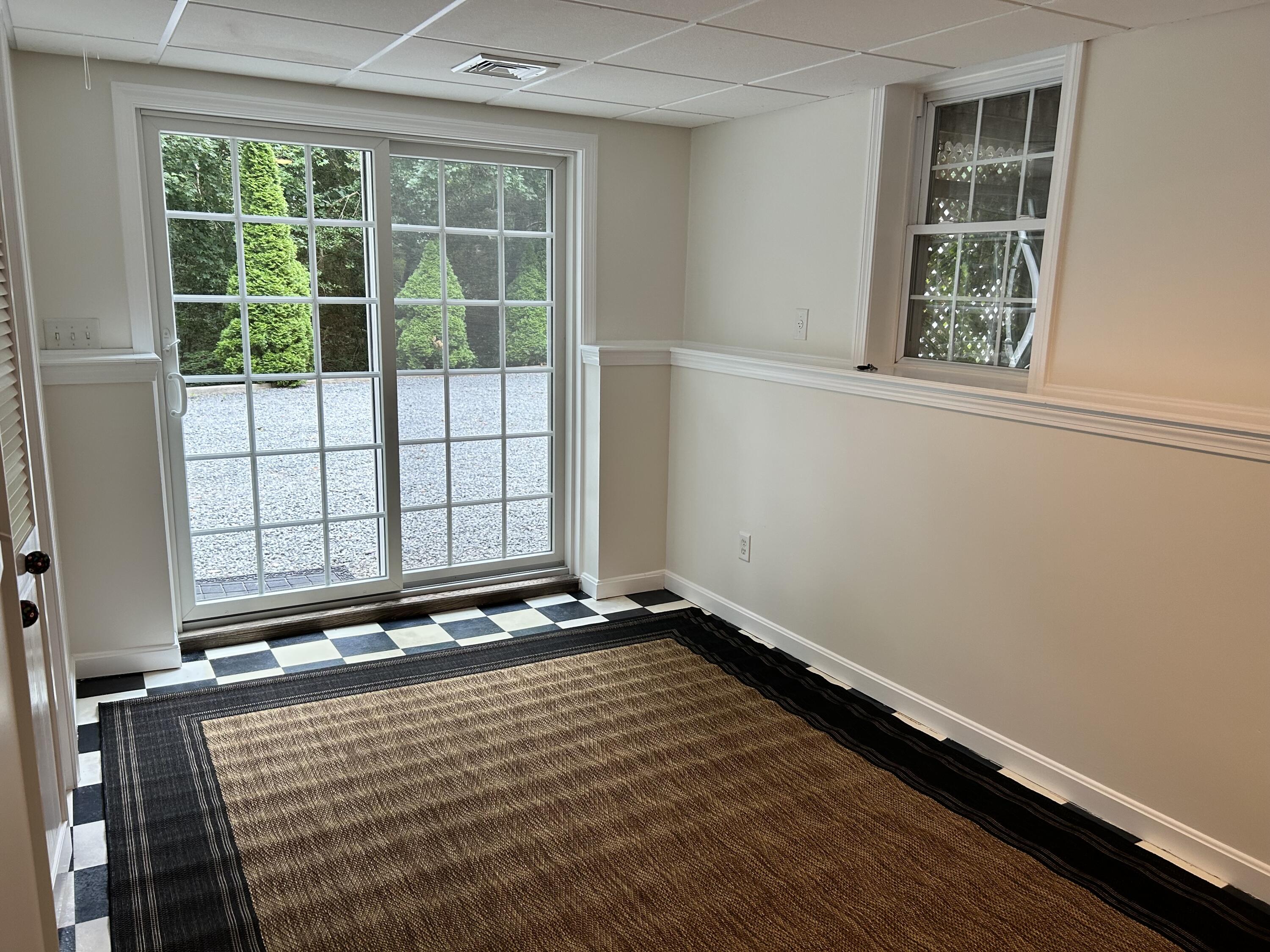 121 Old Post Road Centerville, MA 02632 - Photo 26 of 39 a view of an empty room with a window