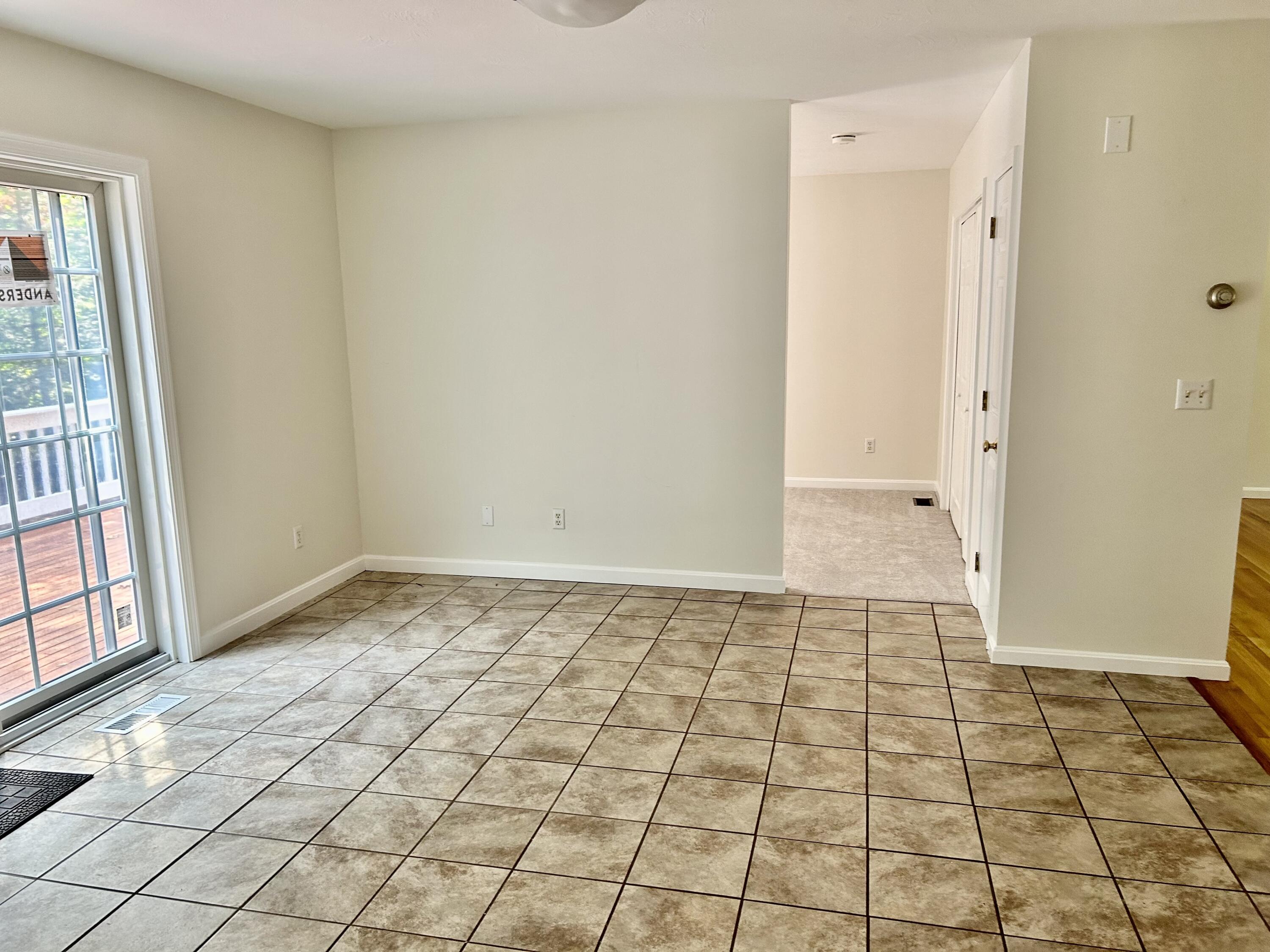 121 Old Post Road Centerville, MA 02632 - Photo 3 of 39 a view of an empty room and window