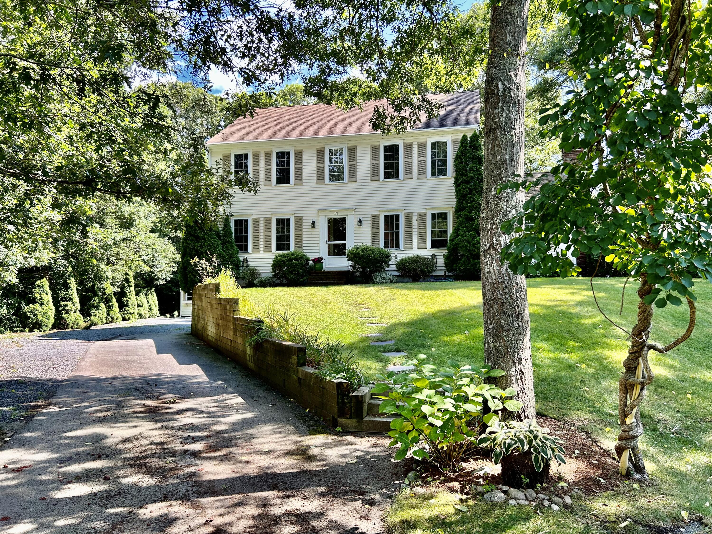 121 Old Post Road Centerville, MA 02632 - Photo 31 of 39 a view of a house with a big yard plants and large trees