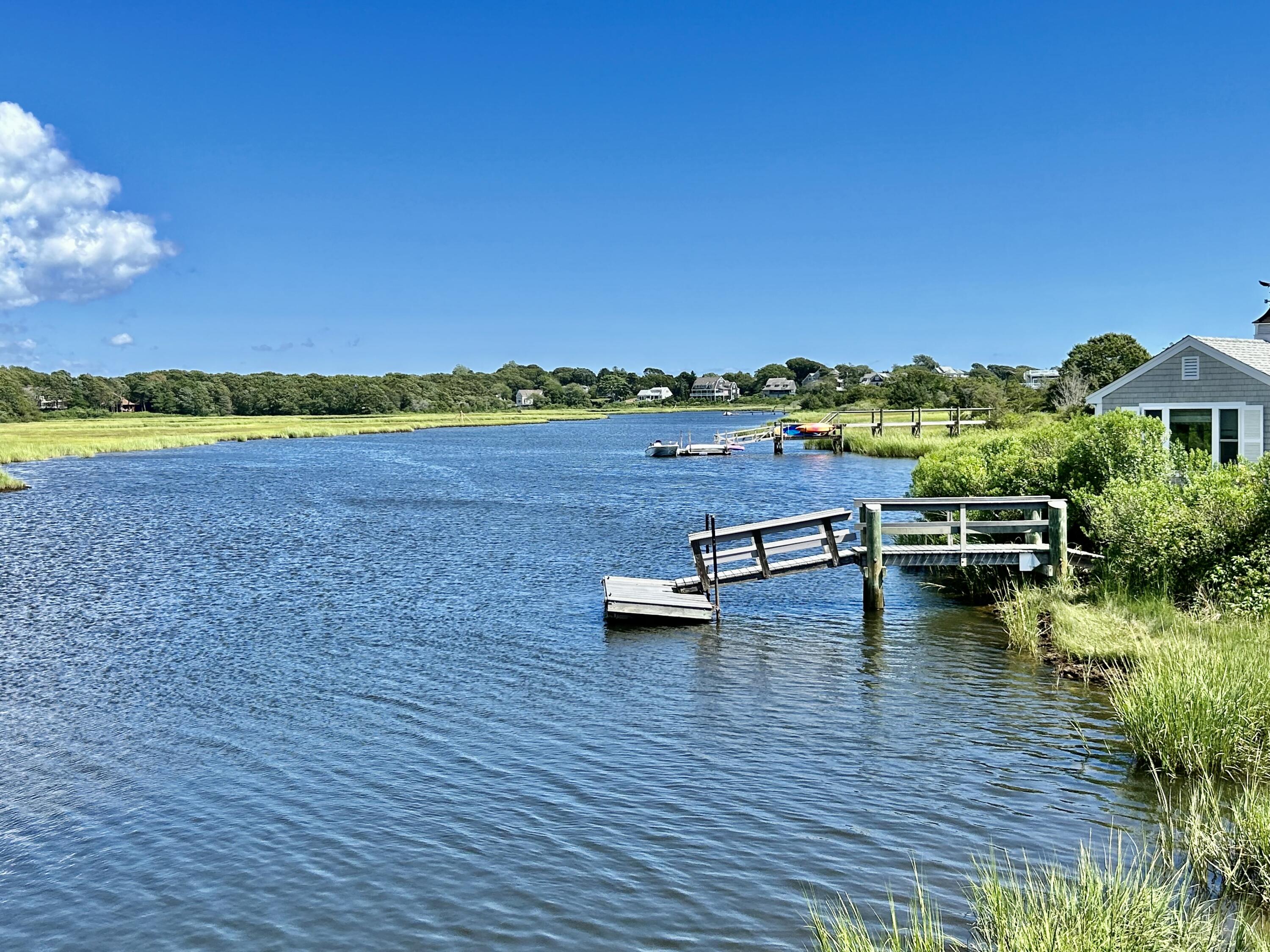 121 Old Post Road Centerville, MA 02632 - Photo 38 of 39 a view of a lake with houses in the back
