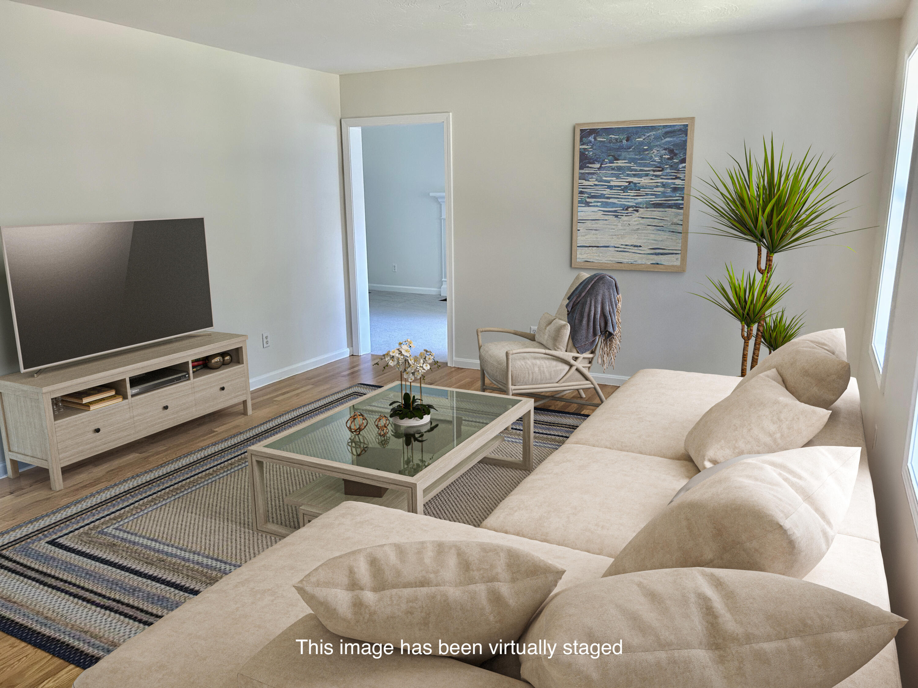 121 Old Post Road Centerville, MA 02632 - Photo 6 of 39 a living room with furniture and a flat screen tv