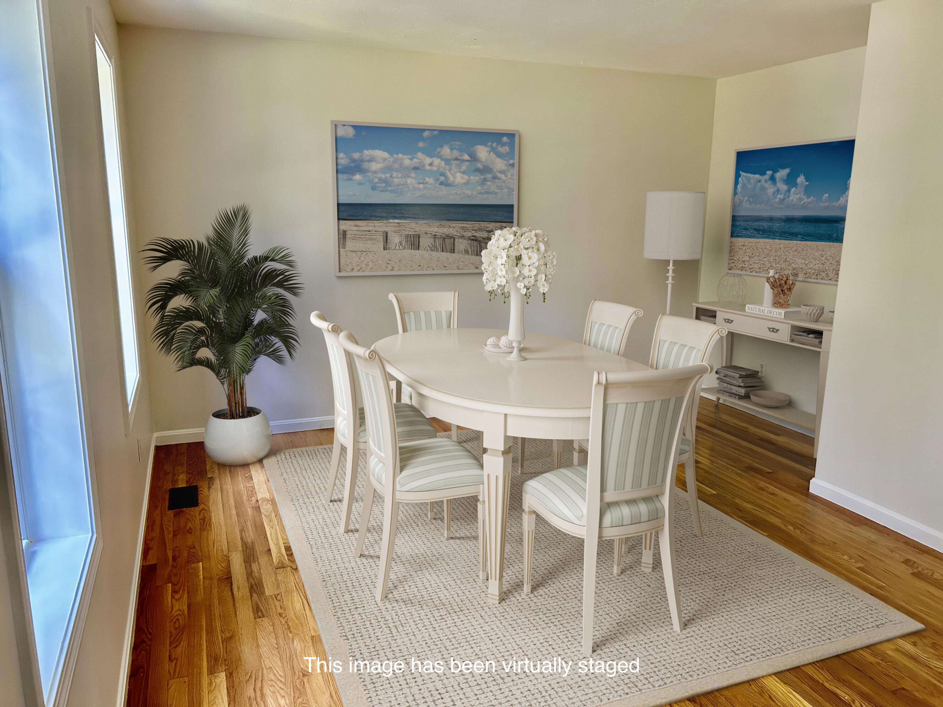121 Old Post Road Centerville, MA 02632 - Photo 10 of 39 a view of a dining room with furniture and wooden floor
