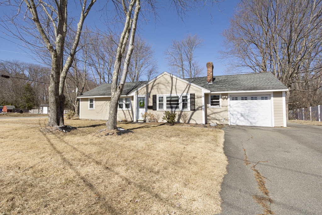 29 Reo Road Maynard, MA 01754 - Photo 2 of 23 a view of large house with a yard covered in snow