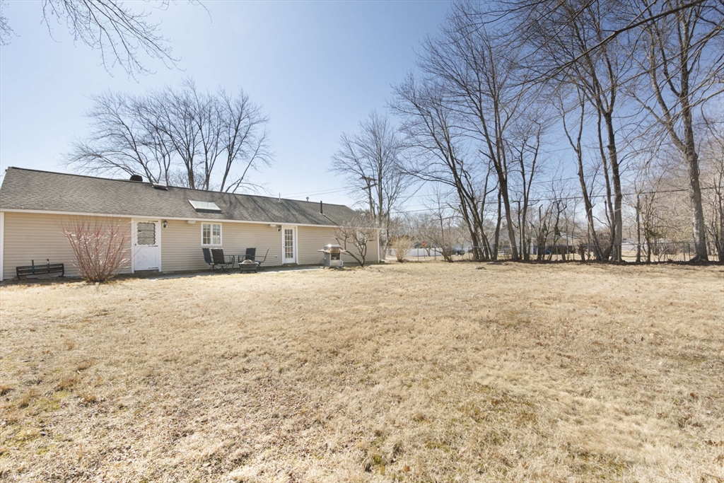 29 Reo Road Maynard, MA 01754 - Photo 3 of 23 a view of yard covered with snow in front of house