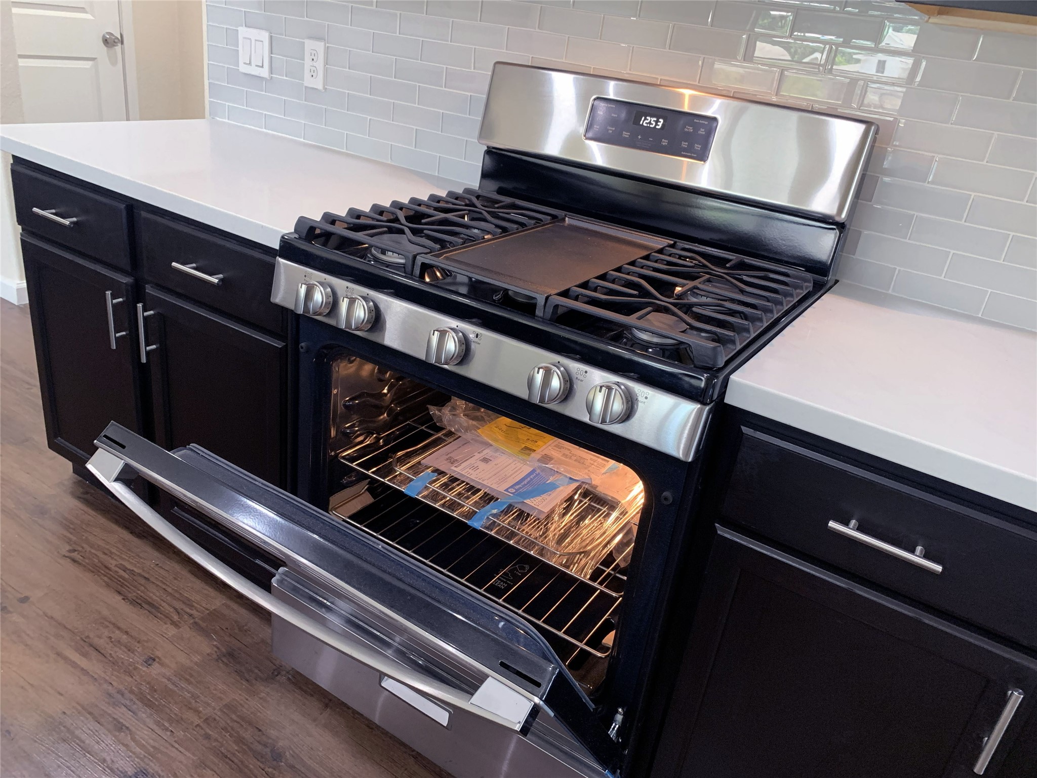 5612 Rainflower Terrace Lane Spring, TX 77389 - Photo 11 of 50 a close up of a stove top oven