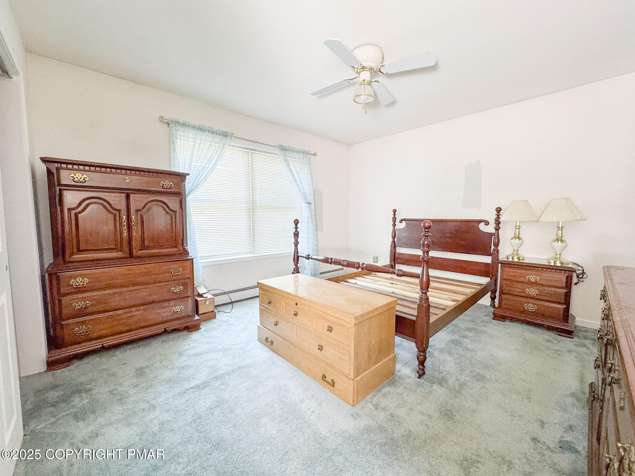 111 Turkey Ridge Drive Kunkletown, PA 18058 - Photo 12 of 30 a living room with furniture and a baby crib