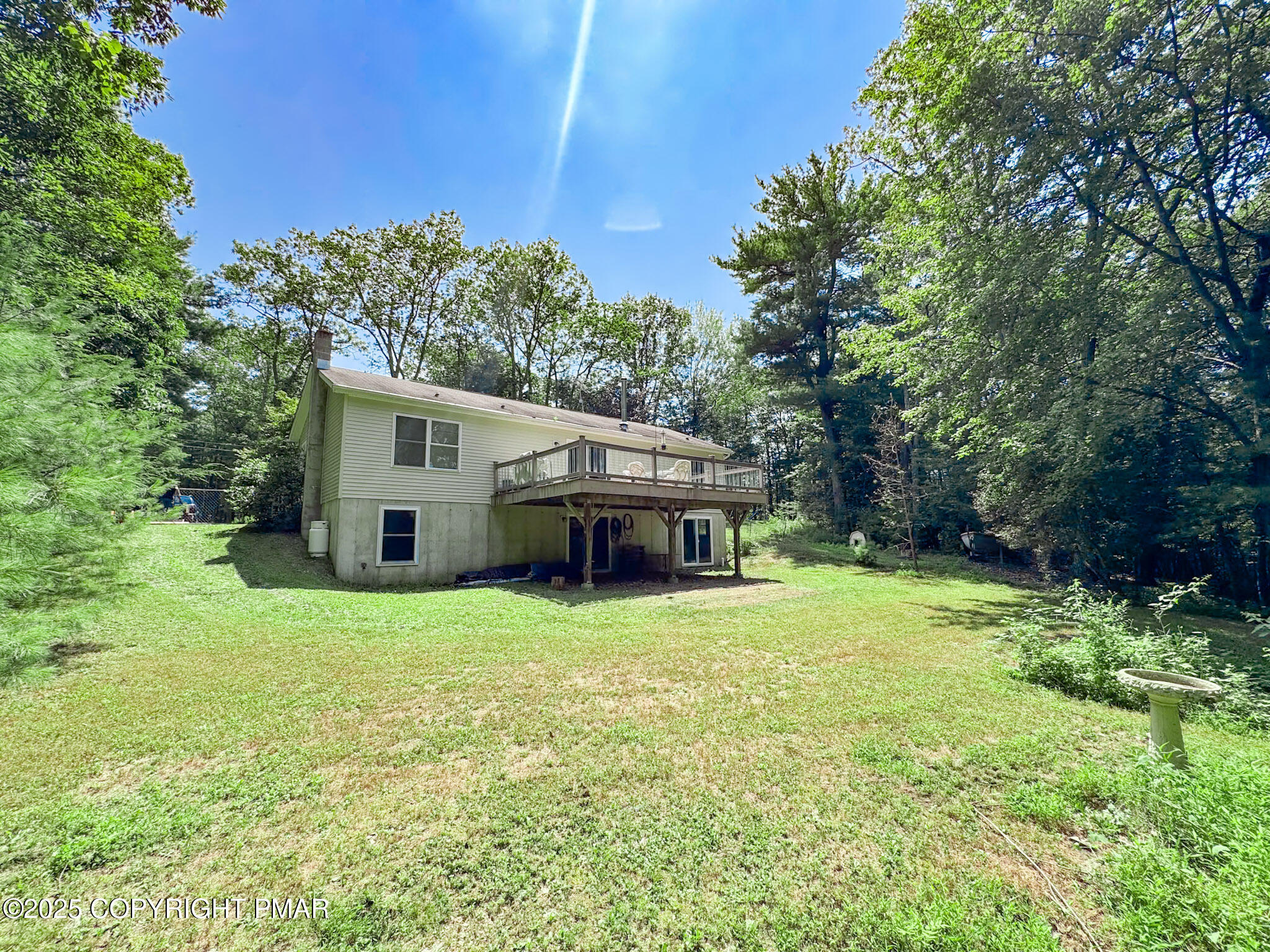 111 Turkey Ridge Drive Kunkletown, PA 18058 - Photo 2 of 30 a house with trees in the background