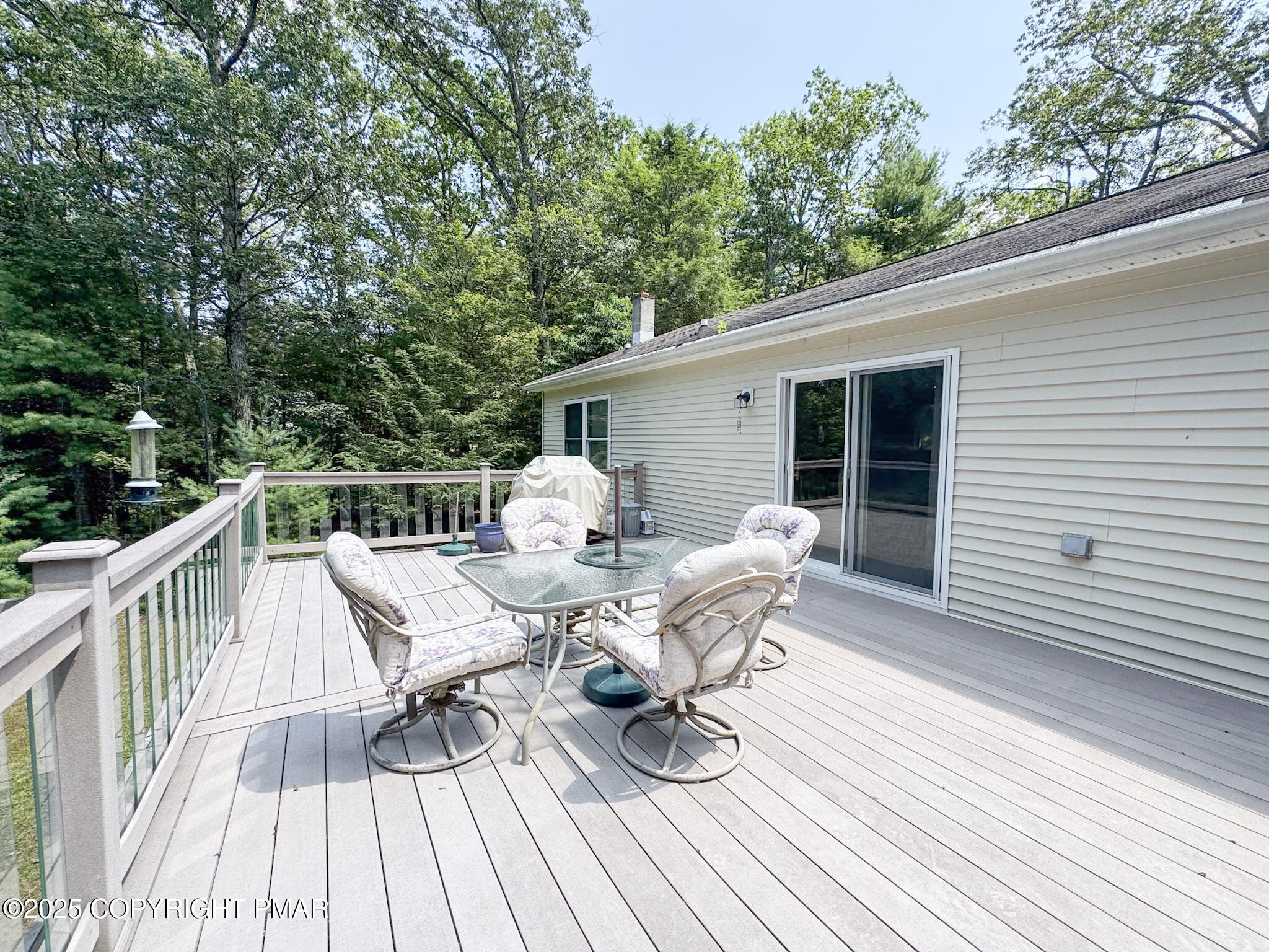 111 Turkey Ridge Drive Kunkletown, PA 18058 - Photo 24 of 30 a view of a deck with chairs and wooden floor