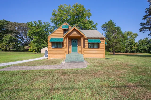 a house view with a garden space