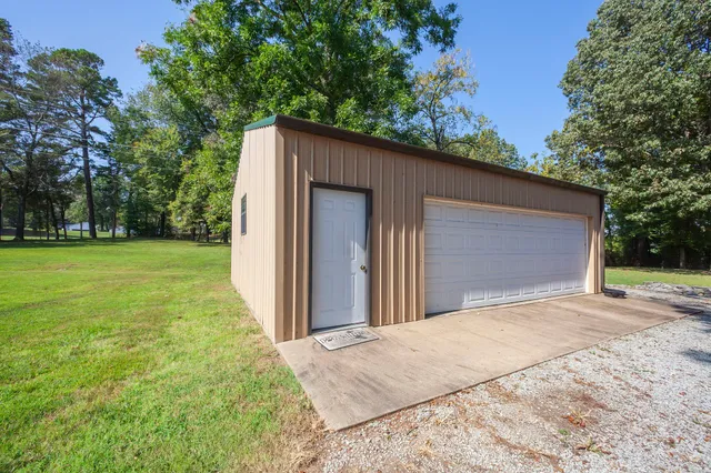 a view of a backyard of the house