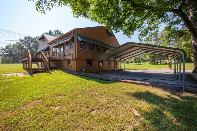 a view of a house with a swimming pool
