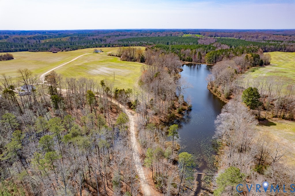 32082 Sparta Road Milford, VA 22514 - Photo 9 of 39 a view of a lake with houses in the back