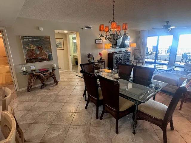 a bedroom with two beds and a window