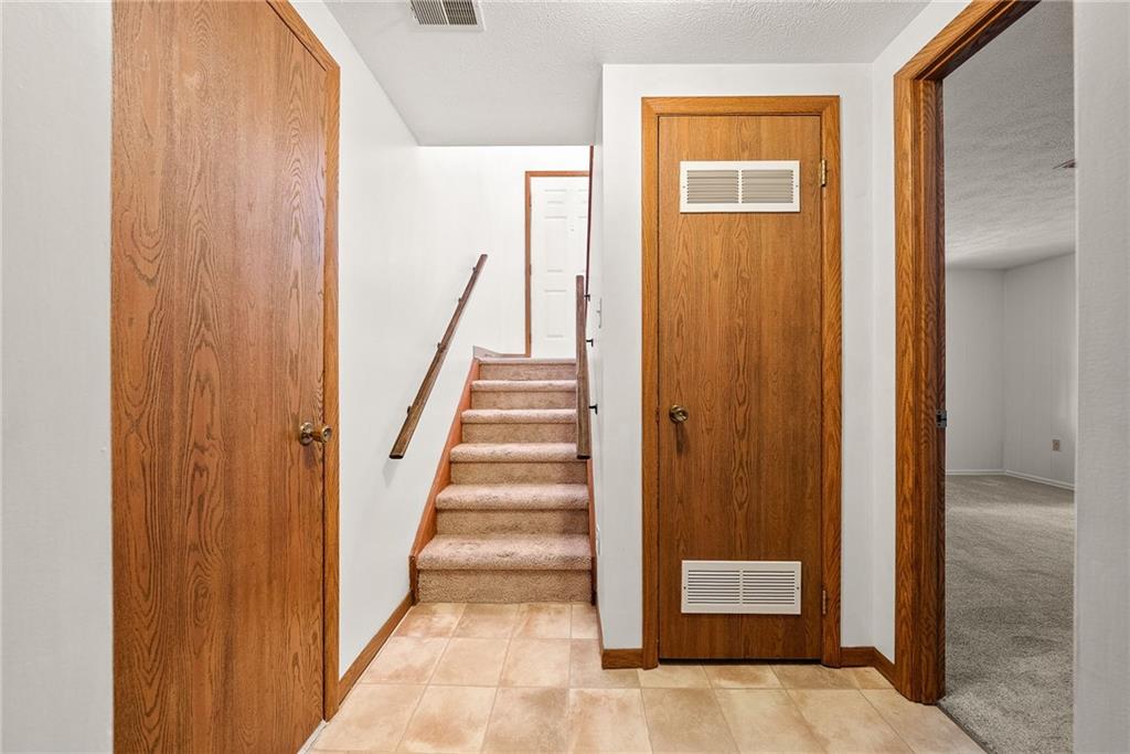 2775 Tischler Road Bethel Park, PA 15102 - Photo 19 of 33 a view of a hallway with wooden floor and entryway
