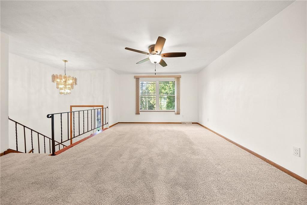 2775 Tischler Road Bethel Park, PA 15102 - Photo 2 of 33 an empty room with windows and fan