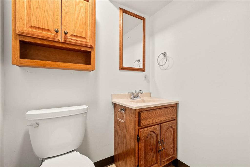 2775 Tischler Road Bethel Park, PA 15102 - Photo 24 of 33 a bathroom with a toilet a sink and a mirror