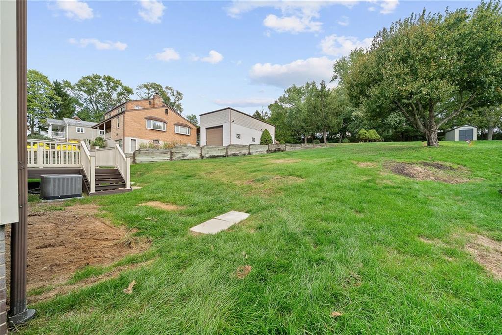 2775 Tischler Road Bethel Park, PA 15102 - Photo 32 of 33 a front view of a house with yard and green space