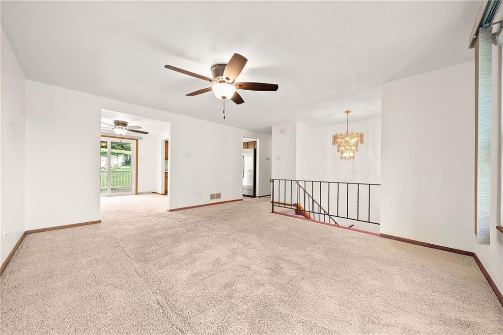 2775 Tischler Road Bethel Park, PA 15102 - Photo 4 of 33 a view of a livingroom with a ceiling fan and window