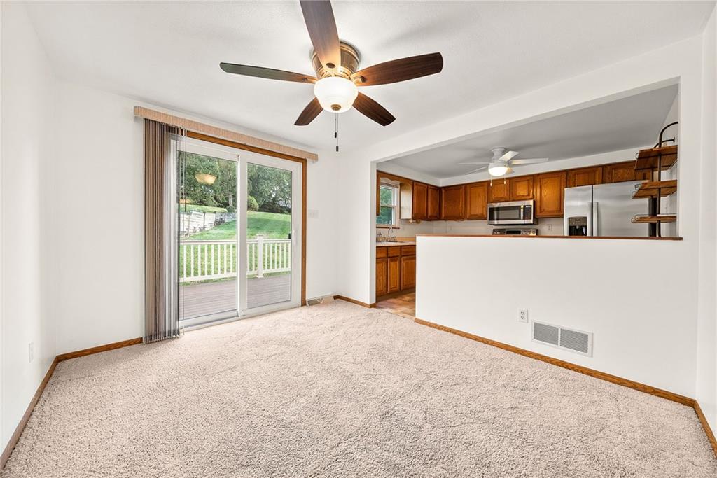 2775 Tischler Road Bethel Park, PA 15102 - Photo 5 of 33 an empty room with ceiling fan and windows