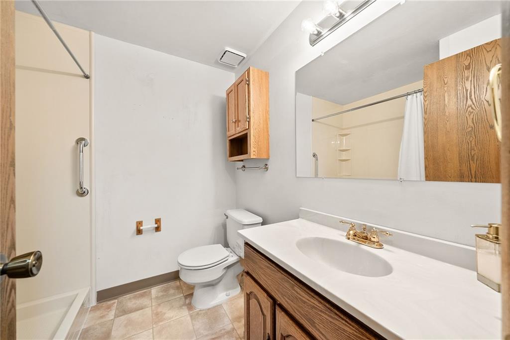 2775 Tischler Road Bethel Park, PA 15102 - Photo 9 of 33 a bathroom with a sink toilet and mirror