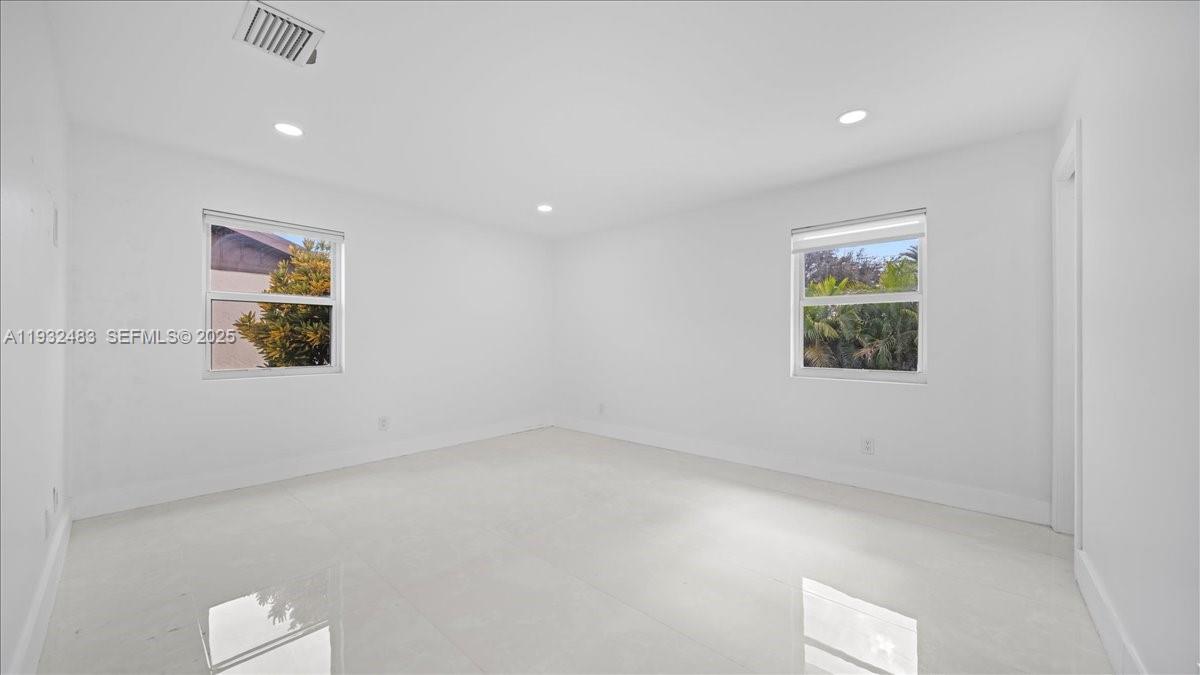 2279 Nova Village Drive Davie, FL 33317 - Photo 8 of 15 an empty room with windows