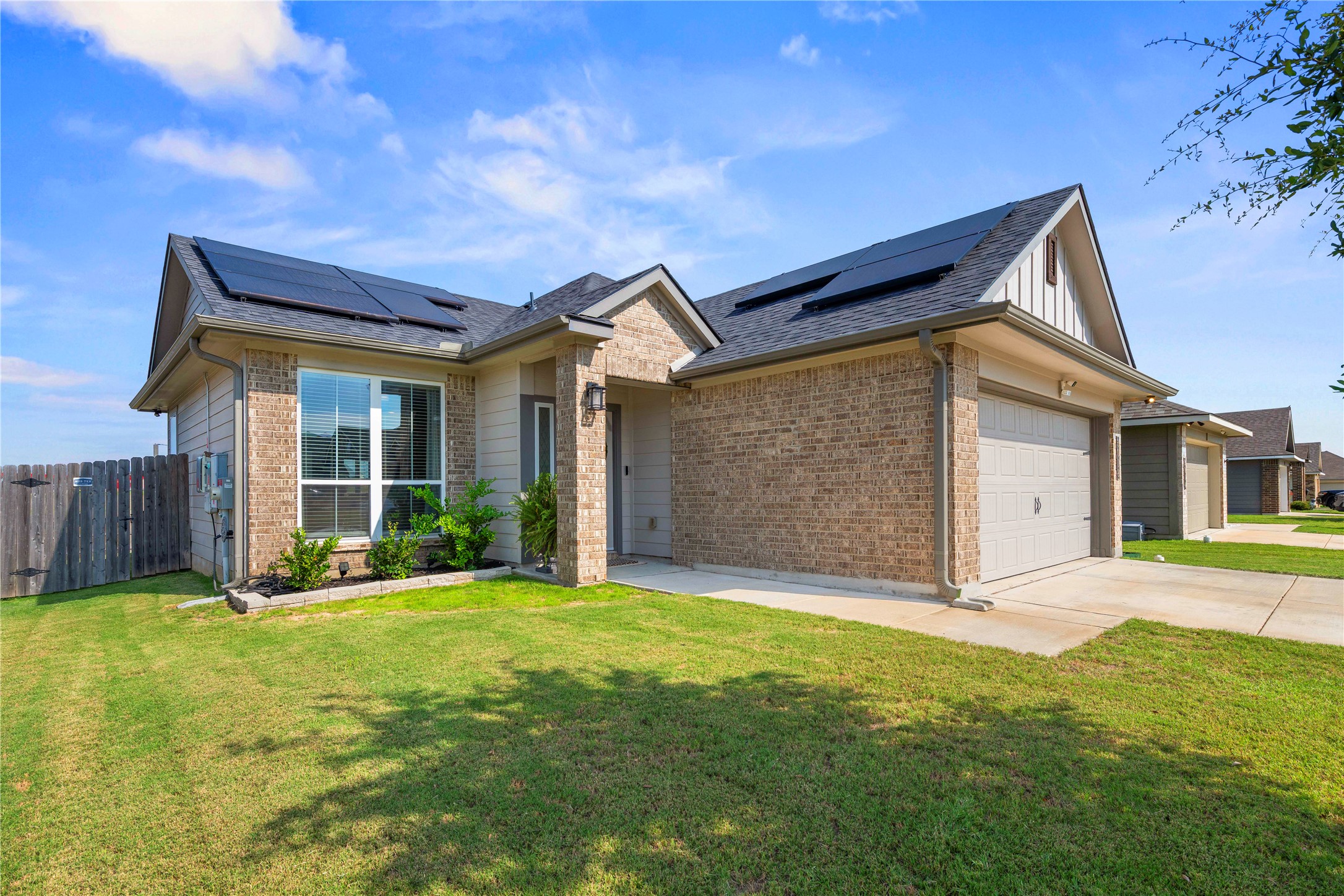 3018 Clevelander Drive Temple, TX 76504 - Photo 2 of 21 a front view of a house with a yard and garage