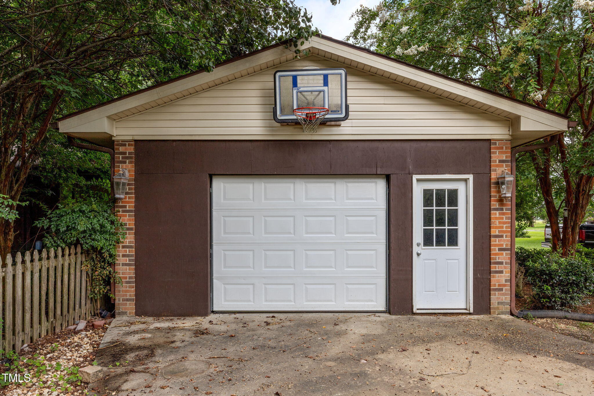 1413 Bud Hawkins Road Dunn, NC 28334 - Photo 35 of 51 Side Entry Garage and features door and a separate driveway.