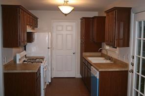 4803 Duval Street, Unit B Austin, TX 78751 - Photo 3 of 6 a bathroom with a sink and a mirror