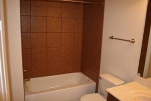 4803 Duval Street, Unit B Austin, TX 78751 - Photo 6 of 6 a bathroom with a bathtub