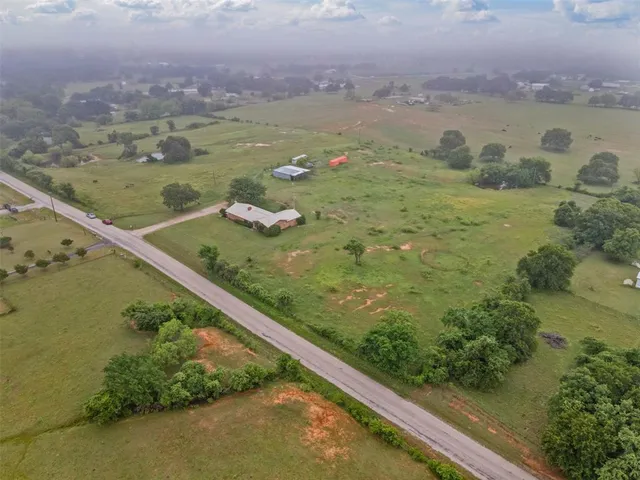 a view of a lake from a yard