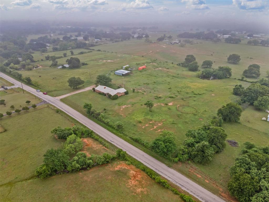 245 County Road 3696 Springtown, TX 76082 - Photo 26 of 29 a view of a lake from a yard