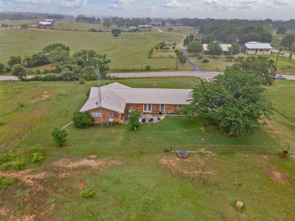 245 County Road 3696 Springtown, TX 76082 - Photo 29 of 29 a view of a lake with a mountain in the background