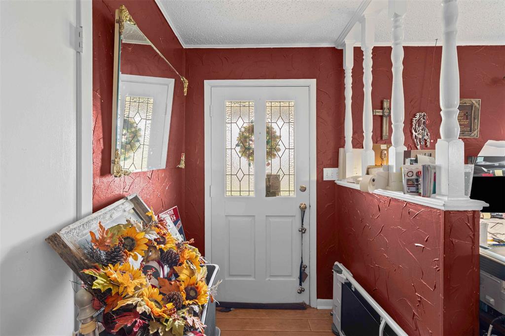 245 County Road 3696 Springtown, TX 76082 - Photo 6 of 29 view of living room with furniture and window