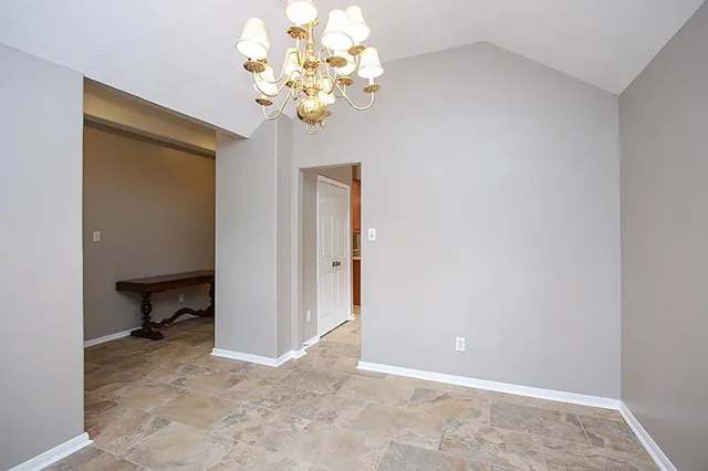 a view of a chandelier and a workspace