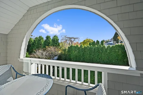 a view of a two chair in the balcony