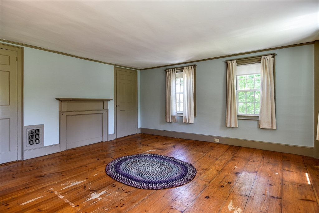 33 Grove Street Framingham, MA 01701 - Photo 15 of 33 an empty room with wooden floor and window