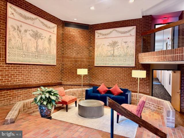 1099 22nd Street Northwest, Unit 103 Washington, DC 20037 - Photo 2 of 4 Residents lounge in lobby