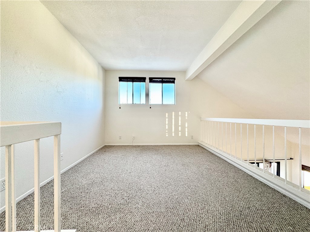 109 Fallingstar, Unit 61 Irvine, CA 92614 - Photo 28 of 34 an empty room with windows