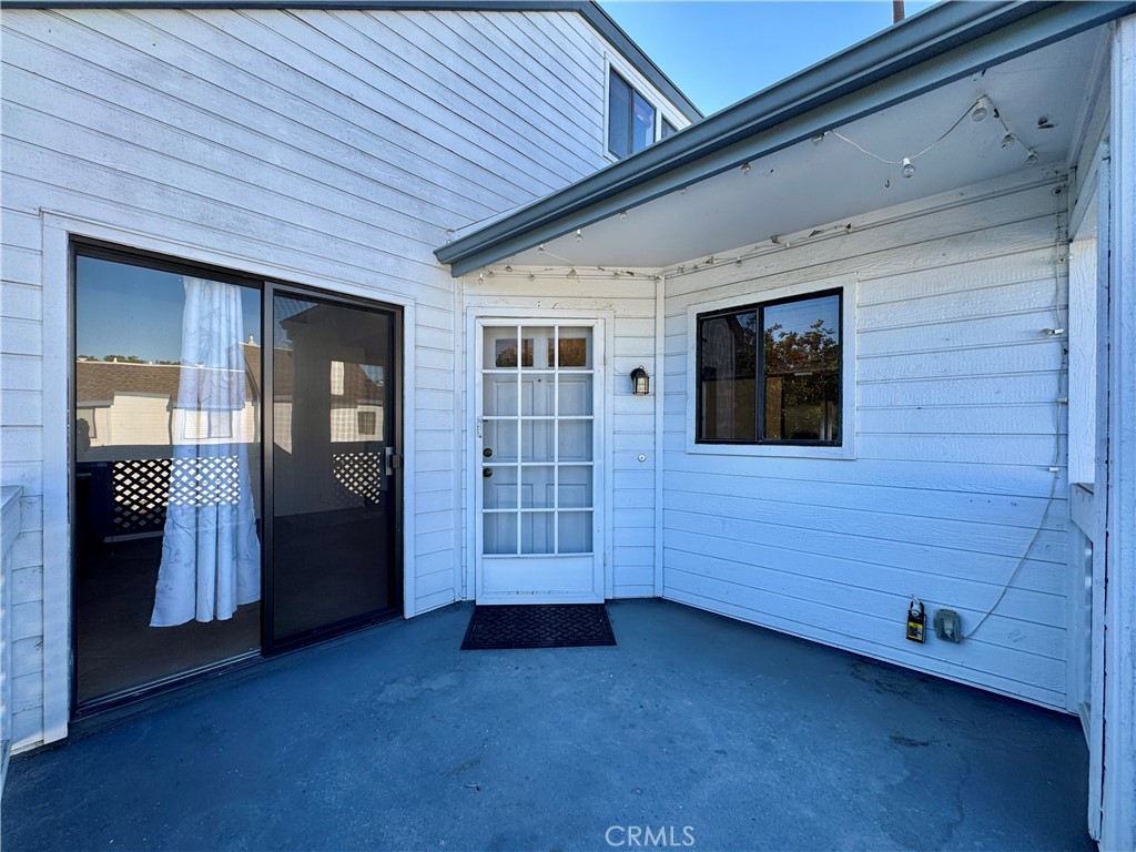 109 Fallingstar, Unit 61 Irvine, CA 92614 - Photo 3 of 34 a view of an entryway door in the house
