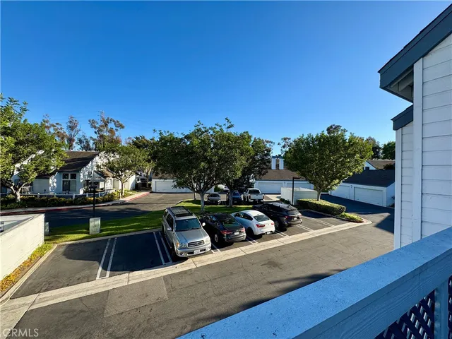 a view of a swimming pool with chairs