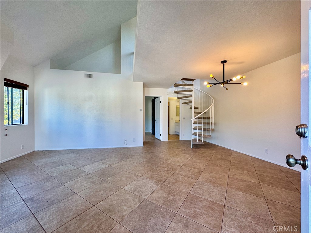 109 Fallingstar, Unit 61 Irvine, CA 92614 - Photo 8 of 34 a view of a livingroom with a fireplace