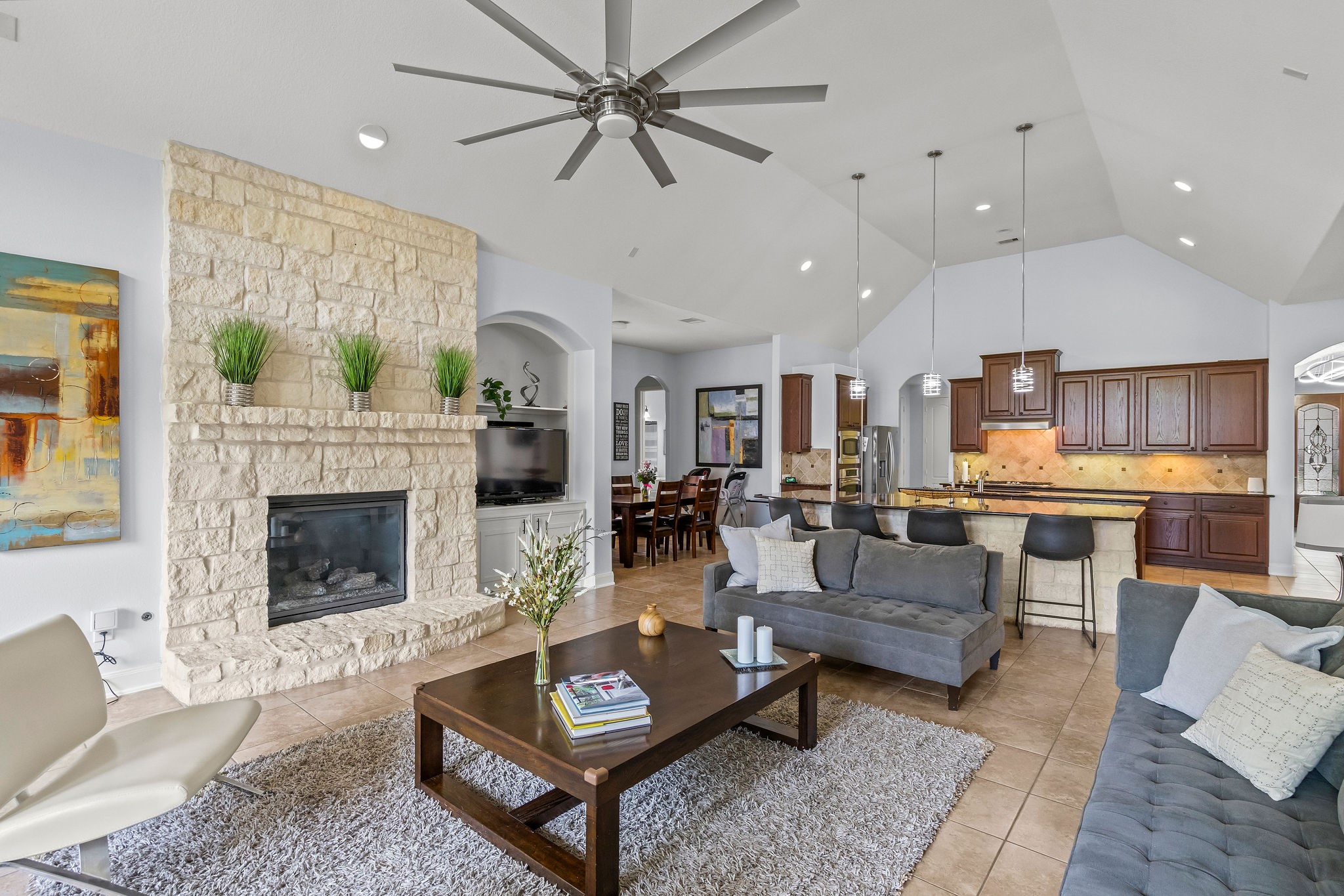 31114 Lakeview Bend Lane Spring, TX 77386 - Photo 22 of 41 a living room with furniture and a fireplace