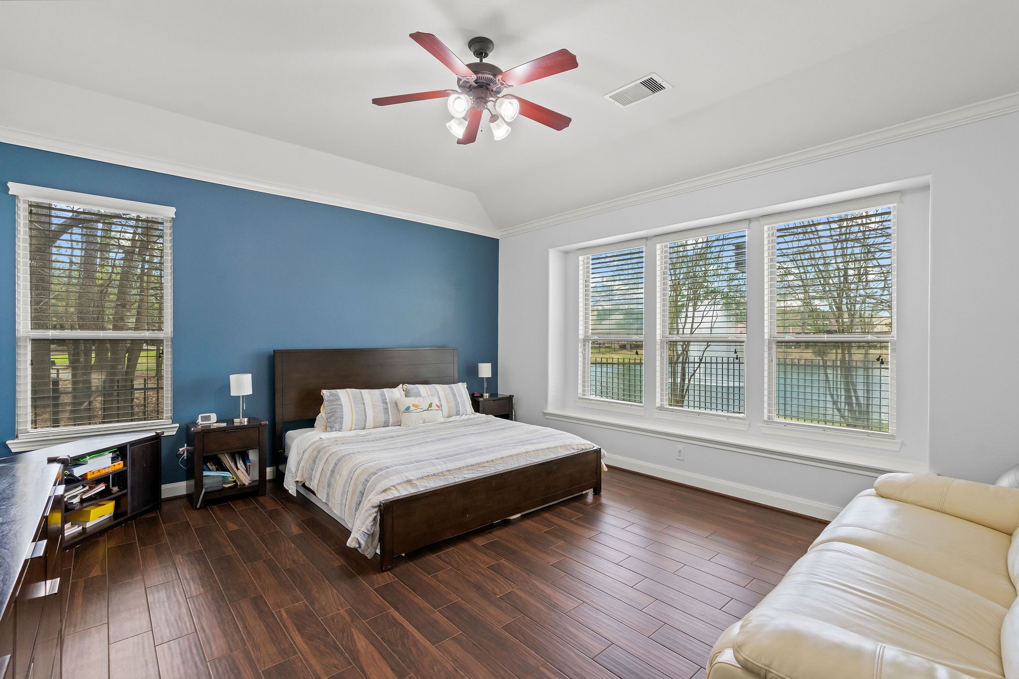 31114 Lakeview Bend Lane Spring, TX 77386 - Photo 31 of 41 a bedroom with a bed and glass window