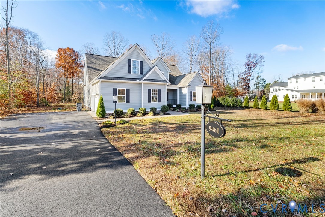 9461 Wickham Crossing Way Ashland, VA 23005 - Photo 2 of 30 a front view of house with yard
