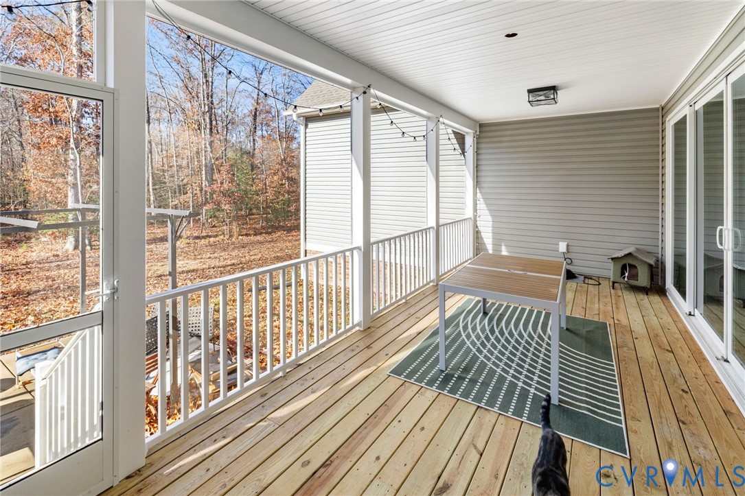 9461 Wickham Crossing Way Ashland, VA 23005 - Photo 26 of 30 a view of a balcony with wooden floor