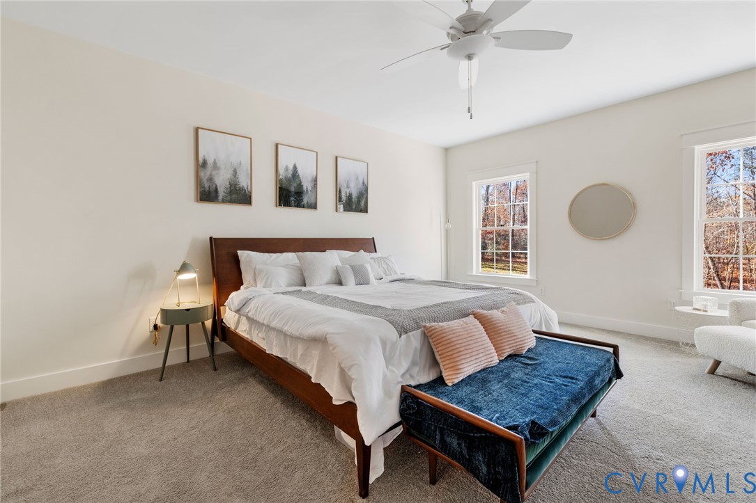 9461 Wickham Crossing Way Ashland, VA 23005 - Photo 10 of 30 a bedroom with a bed and window
