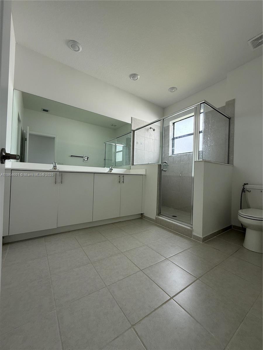 28532 Southwest 133rd Path Homestead, FL 33033 - Photo 14 of 18 a view of a kitchen with a sink cabinets and window