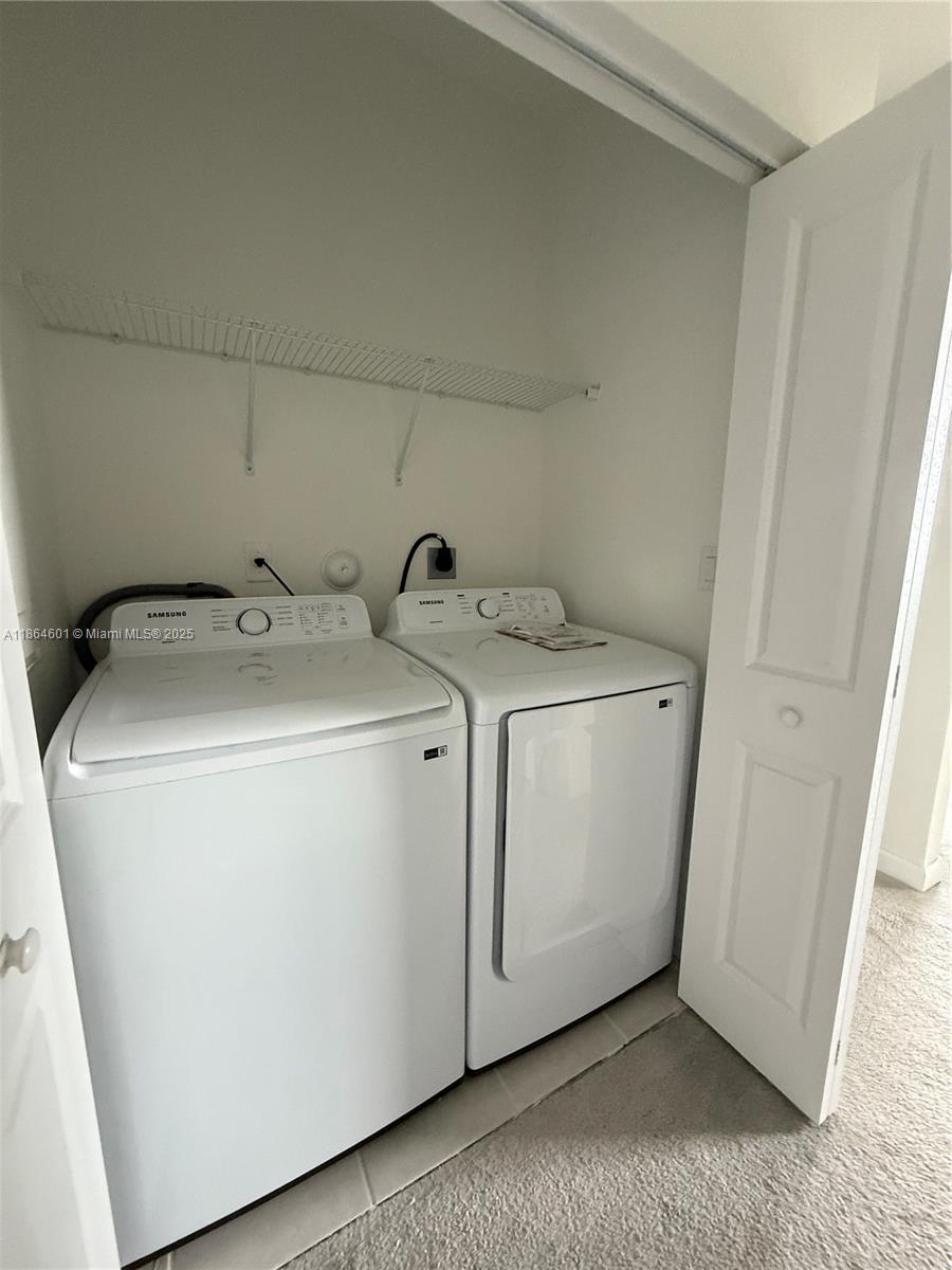 28532 Southwest 133rd Path Homestead, FL 33033 - Photo 17 of 18 a utility room with dryer and washer