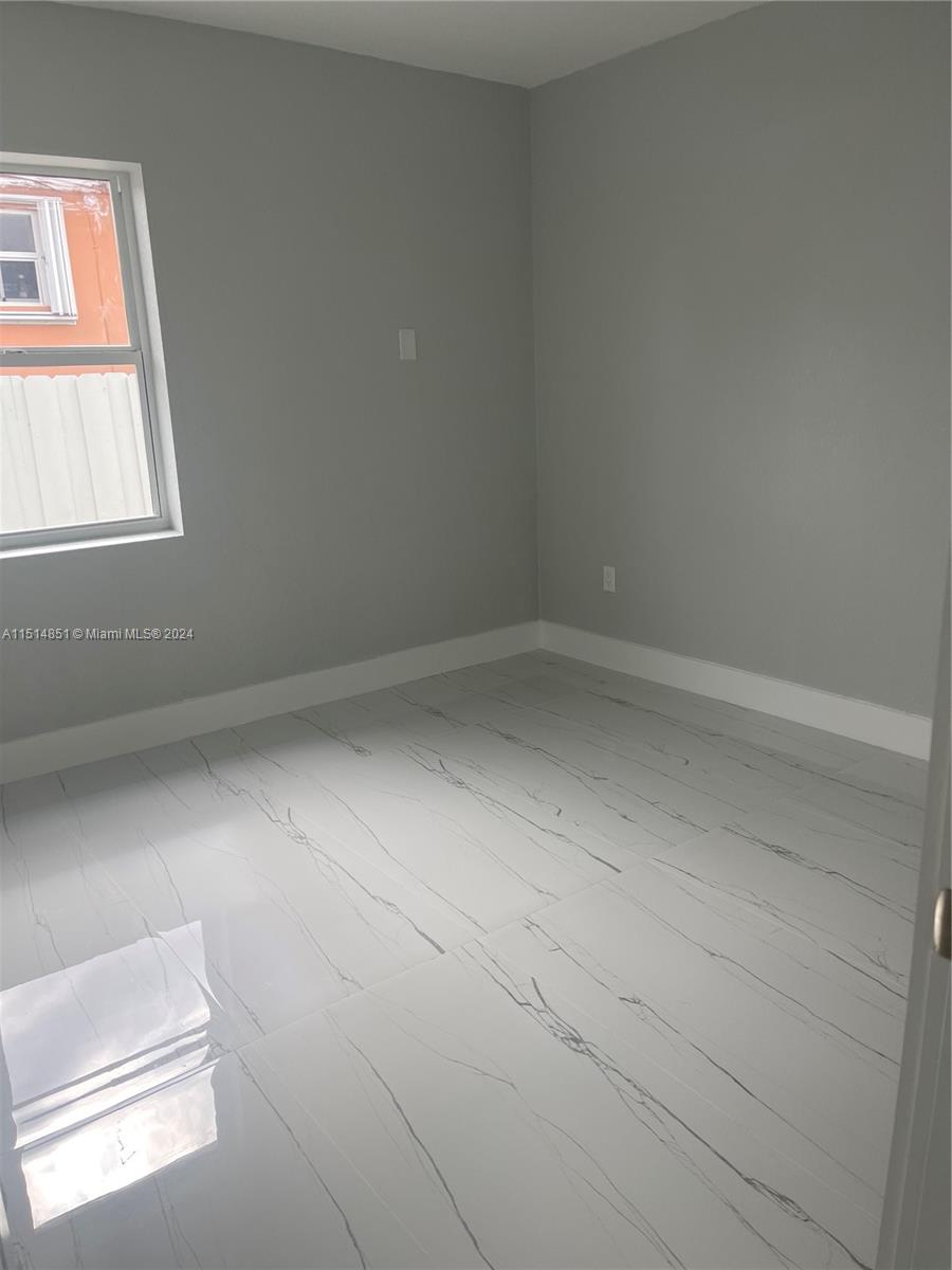 516 Southwest 66th Avenue Miami, FL 33144 - Photo 14 of 27 a view of room and window